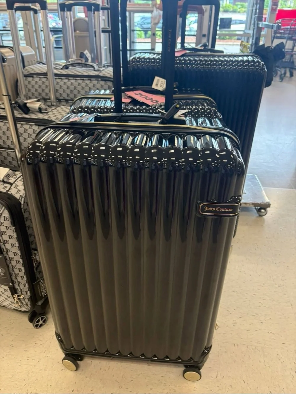 ISO! Looking for this Juicy Couture Luggage Set in pink or black!